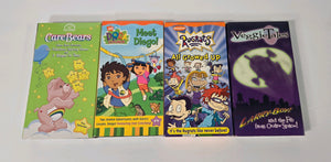 VHS lot of 4 Rugrats All Growed Up, Dora Meet Diego!, Care Bears & Veggie Tales